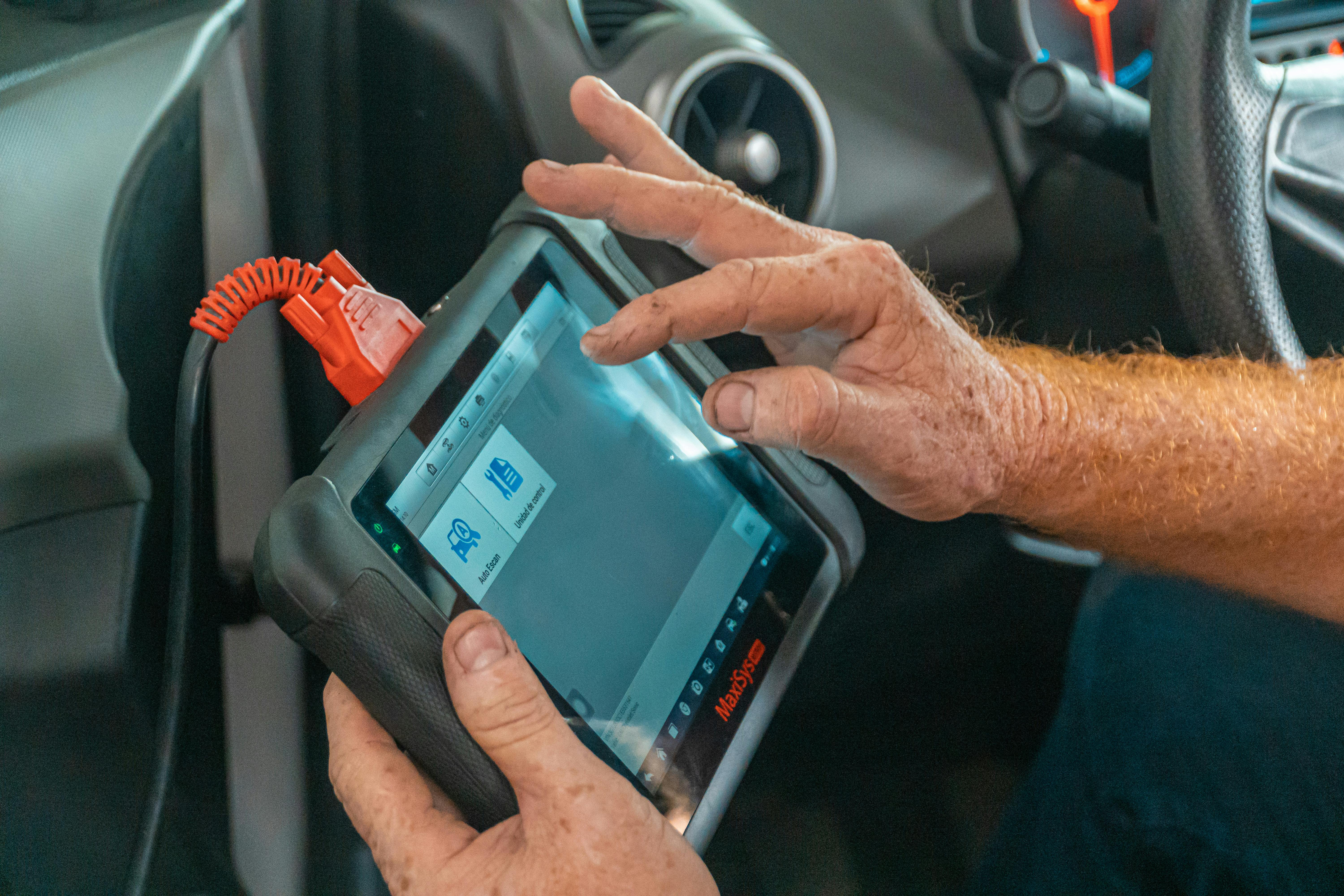 Diagnostic scan equipment used during vehicle service